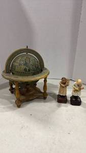 lot 2104 image: Mini old world globe 12 inches tall and 2 Dr figurines