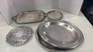 lot 2145 image: Wallace silver-plated expandable trivet, and serving trays and platters