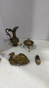 lot 2151 image: Brass pitcher 7 inches tall, camel trinket dish and more