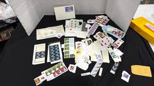 lot 2203 image: Stamps collector and some never used