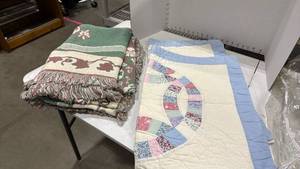 lot 2311 image: Quilted pillow shams and throw blanket
