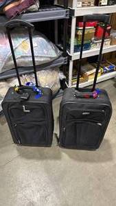 lot 2332 image: 2 carryon travel bags with back wheels
