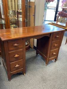 lot 3009 image: Springfield Furniture Co rolling 6 drawer rolling walnut vanity31 x 46 x 18 in with vanity stool