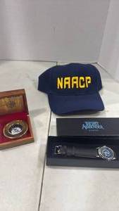 lot 6094 image: NAACP hat, compass, and watch