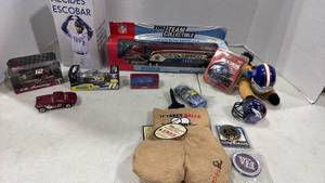 lot 6110 image: Sports Collectibles Lot - NASCAR Diecast Cars & NFL Helmets and more