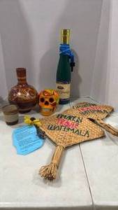 lot 6121 image: Hand-painted Mexican clay water jug, handmade straw weave fans from Guatemala and more