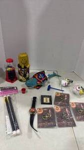 lot 6126 image: Hunger games Mockingjay pins, and more