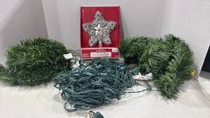 lot 1269 image: Light up tree topper, lights and prelit garland
