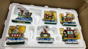 lot 1274 image: Disney Donald Holiday express train set