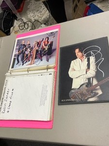lot 1884 image: 3 ring binder with various celebrities, some pictures have signatures (not authenticated)