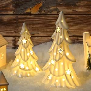 lot 3163 image: AOMOONOA Ceramic White Christmas Trees with Lights, 2Pcs Light Up Tabletop Porcelain Christmas Tree, Glossy Hollow-Carved Small Xmas Tree Figurines for Modern Home Decoration, DIY Winter Village