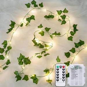 lot 9227 image: JMEXSUSS 33Ft Vines with Lights Battery Operated, 100 LED Ivy Vines with Fairy Lights Leaf with Remote, Battery Twinkle Light for Bedroom Wall Classroom Dorm Wedding Party Valentines Decor(Warm White)