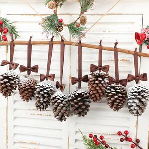 lot 7664 image: 8 Pcs Large Christmas Pine Cones Crafts with Ribbon String and Bow 2.8-3.5 Inch Natural Rustic Snow Pinecones Hanging Ornament for Xmas Tree Fall Winter Decor Home Holiday DIY Crafts