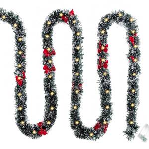 lot 4147 image: 16.4 Ft Dark Green Frost Tip Metallic Tinsel Garland with 50 Warm LED Lights, Artificial Xmas Tree Decoration for Indoor Outdoor, Holiday Party Supplies