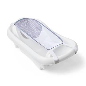 lot 15030 image: The First Years Sure Comfort Deluxe Newborn-to-Toddler Tub with Sling - White