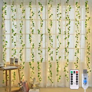 lot 6184 image: JMEXSUSS Vines Lights for Bedroom, 200 LED Vines Fairy Lights, Artificial Ivy Leaf Light for Wall Curtain Wedding Party Christmas Indoor Decor, 6.5ft x 6.5ft with Remote