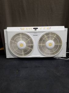 lot 3449 image: Pelonis Twin Window Fan with Remote