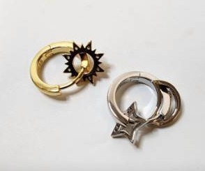 lot 67205 image: Sun and Star Earing Set