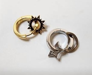 lot 67206 image: Sun and Star Earing Set