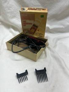 lot 77 image: Oster Pet Grooming Kit with Attachments