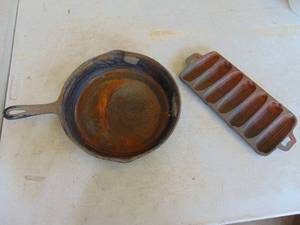 lot 2348 image: Cast iron skillet and corn bread pan