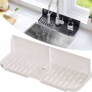 lot 450 image: Folding Faucet Mat for Kitchen Sink Splash Guard5° Slope Fast Self-drainingSnap Lock Fit Kitchen Sink Faucet Mat Splash Guard - Retail $10