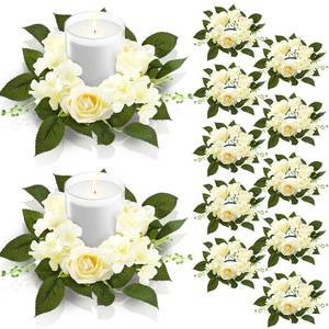 lot 561 image: Jutom 12 Pcs Wedding Rose Candle Rings Artificial Floral Wreaths with Green Leaves Flower Candle Rings Candleholders Garland for Pillar Centerpiece Party Table Decor, 3.94 Inner Diameter, White - Retail $42