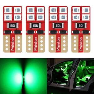 lot 61711 image: PHINLION 194 Green LED Light Bulbs, Super Bright Wedge W5W 168 2825 175 T10 LED Replacement Bulb for Car Interior Dome Map Door Courtesy License Plate Dash Instrument Lights, Pack of 3 - Retail $8