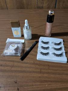 lot 54 image: Makeup Bundle with 3D Mink Lashes and NYX Lip Pencil