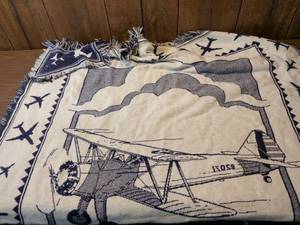 lot 201 image: Boeing 75th Anniversary Commemorative Throw Blanket