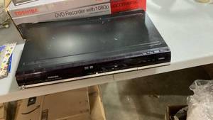 lot 2064 image: Toshiba DVD Recorder with 1080p Upconversion. No remote.