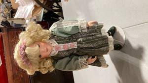 lot 2119 image: Victorian Style Decorative Doll with Sage Green Dress