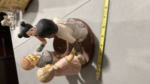 lot 2212 image: Precious Moments Figurine - Children in White Outfits