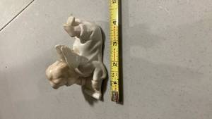 lot 2222 image: White Ceramic Reading Cherub Figurine