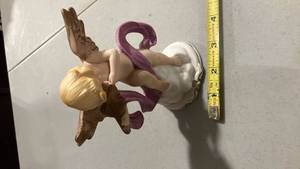 lot 2226 image: Porcelain Angel Figurine with Purple Sash