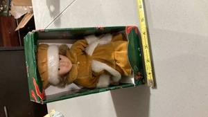lot 2286 image: Doll in gold dress about 8 inches tall