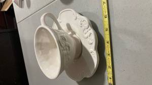 lot 2314 image: White Porcelain Tea Cup and Saucer Set with Embossed Design