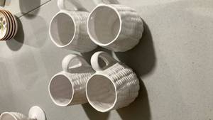 lot 2335 image: White Porcelain Basketweave cup Set