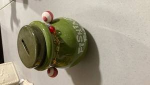 lot 2373 image: Green Ceramic Fish Bank with Bobber Accents