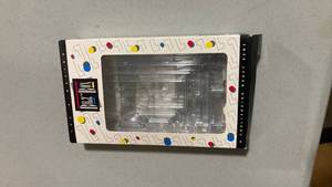 lot 2385 image: Game with plastic case and little ball inside