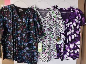 lot 66525 image: APPEARS NEW - Landau and Barco Medical Scrub Tops (Size XL) Lot of 3