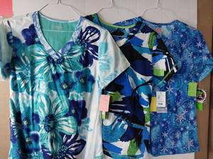 lot 66577 image: APPEARS NEW - Landau Medical Scrub Tops Bundle - Blue Floral and Winter Patterns (Size Medium) Lot of 3