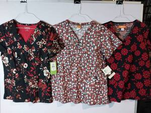 lot 66589 image: APPEARS NEW - Landau, Orange & eLan Brand Medical Scrub Tops (Size Medium) 3 Pack