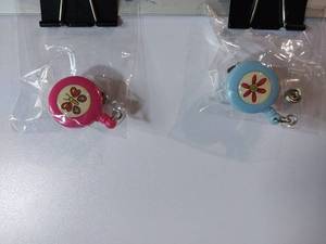 lot 66595 image: APPEARS NEW - Medical Retractable Badge Clip-On Butterfly & Flower (2 Pack)