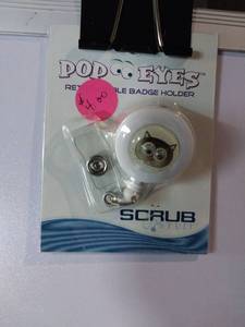 lot 66647 image: APPEARS NEW - Pop Eyes Retractable Badge Holder - Scrub Series, Cat