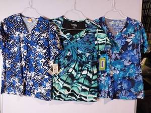 lot 66696 image: APPEARS NEW - Landau, White Swan & Barco Medical Scrub Tops - Blue Floral Collection (Size Medium) 3 Pack