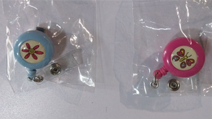 lot 66777 image: APPEARS NEW - Decorative Retractable Badge Reel Set - Butterfly and Flower Design (2 Pack)