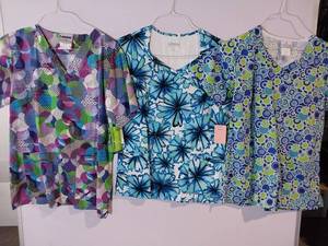lot 66821 image: APPEARS NEW - Landau & Fundamentals Medical Scrub Tops - Multi-Pattern Set (Size Medium) 3 Pack
