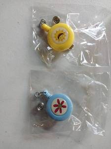 lot 66840 image: APPEARS NEW - Sun and Flower Retractable Badge Reel Set (2 Pack