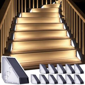 lot 48582 image: ROSHWEY Solar Stair Lights Outdoor Waterproof, 12 Pack Solar Powered Step Lights for Outside, Triangle Deck Step Light, Outdoor Decor Lighting for Front Porch, Backyard, Patio, Cool White - Retail $42